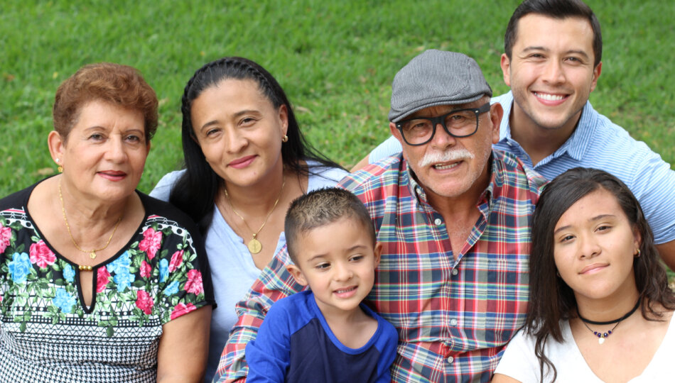 Family photo of Hispanic family outdoors
